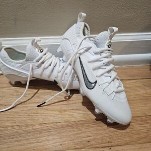 White Nike Lacrosse Cleats with Black Swoosh